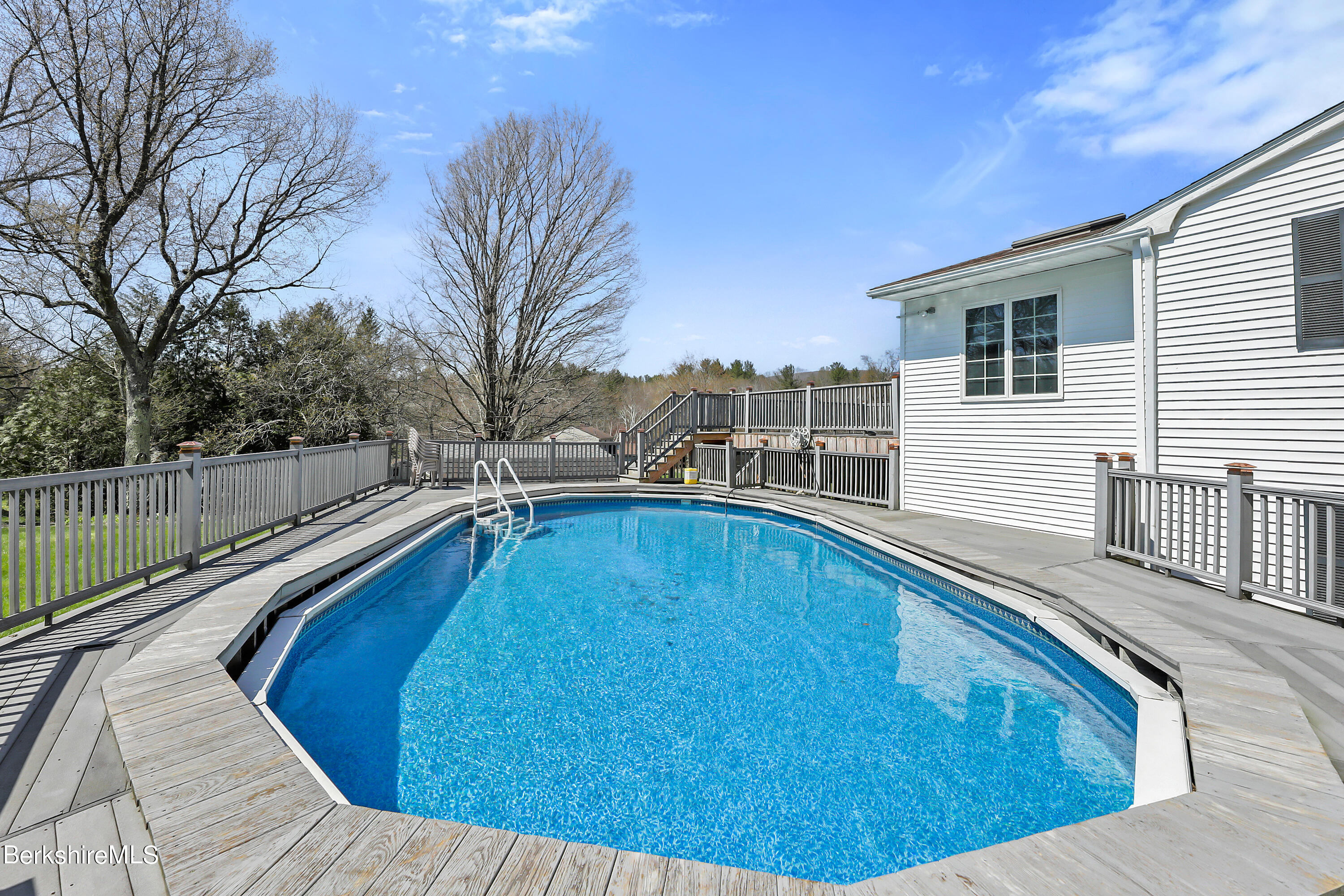 31 Olsen Road Lanesborough, MA 01237 - Photo 27 of 31 a view of a swimming pool with a patio