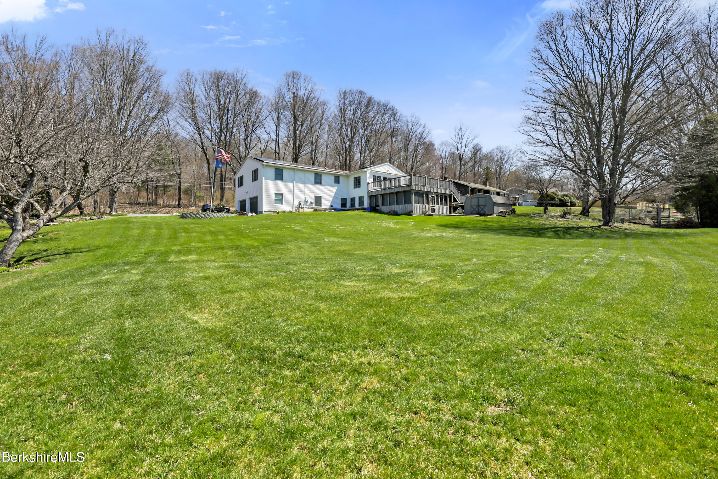 31 Olsen Road Lanesborough, MA 01237 - Photo 31 of 31 a view of a green field with house in the background
