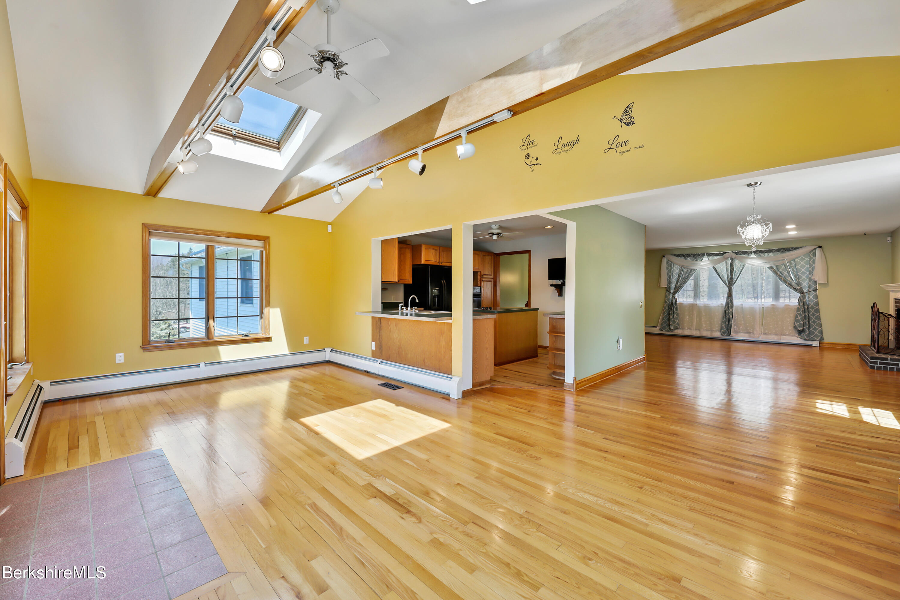 31 Olsen Road Lanesborough, MA 01237 - Photo 9 of 31 a view of an empty room with wooden floor and a window