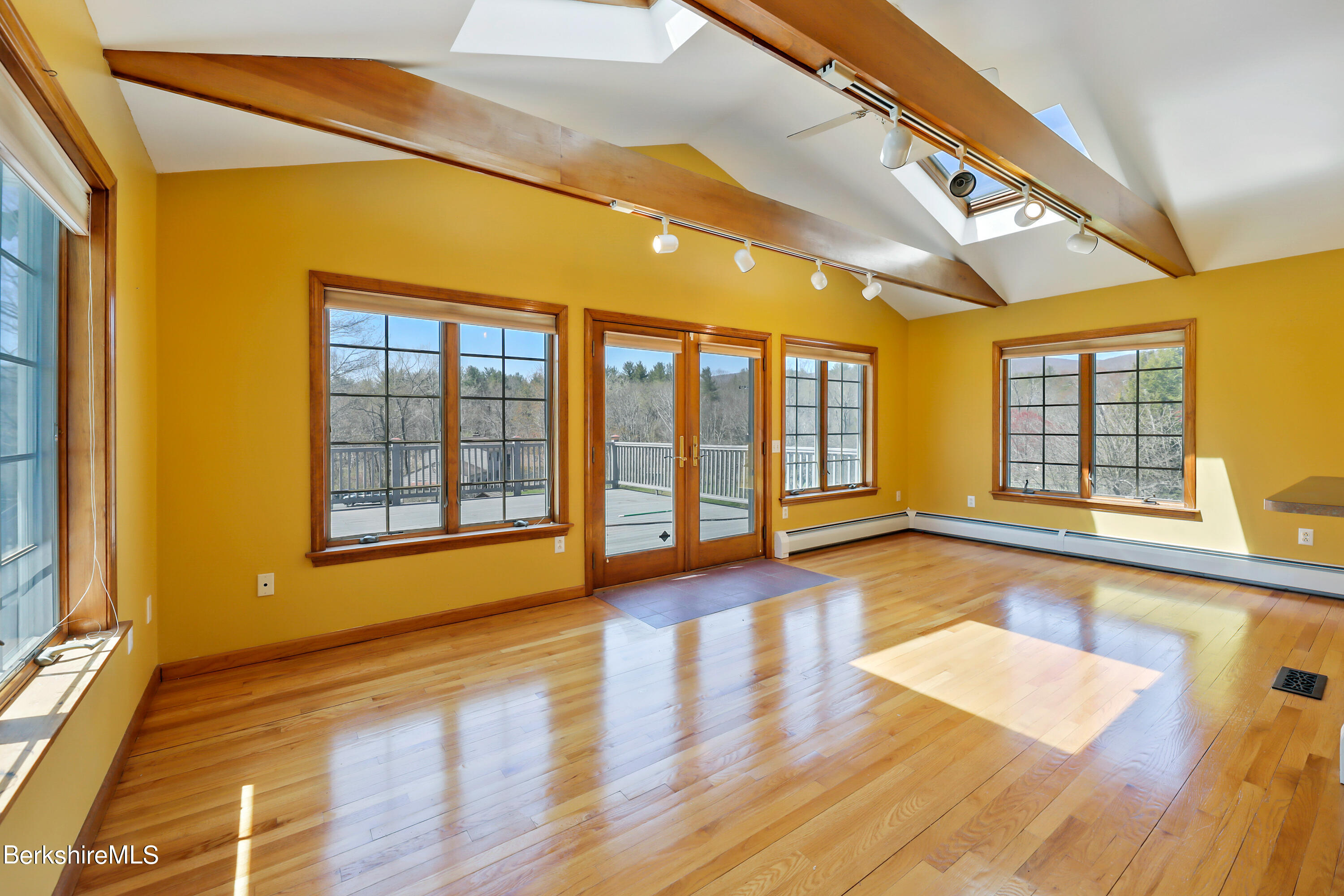 31 Olsen Road Lanesborough, MA 01237 - Photo 10 of 31 a view of an empty room with wooden floor and a window