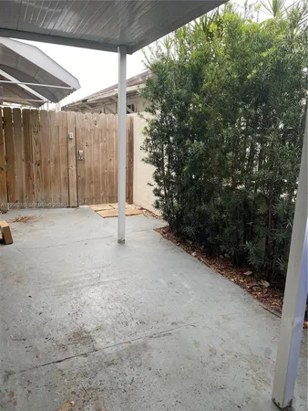 a view of backyard with green space