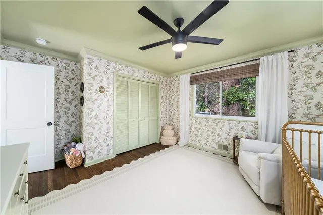 a living room with a couch and a window