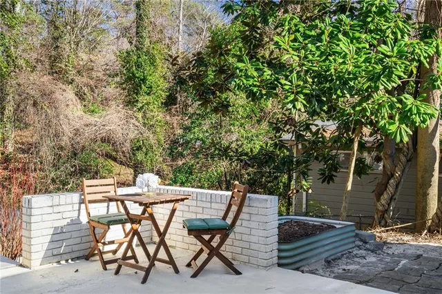 a aerial view of a house with a yard