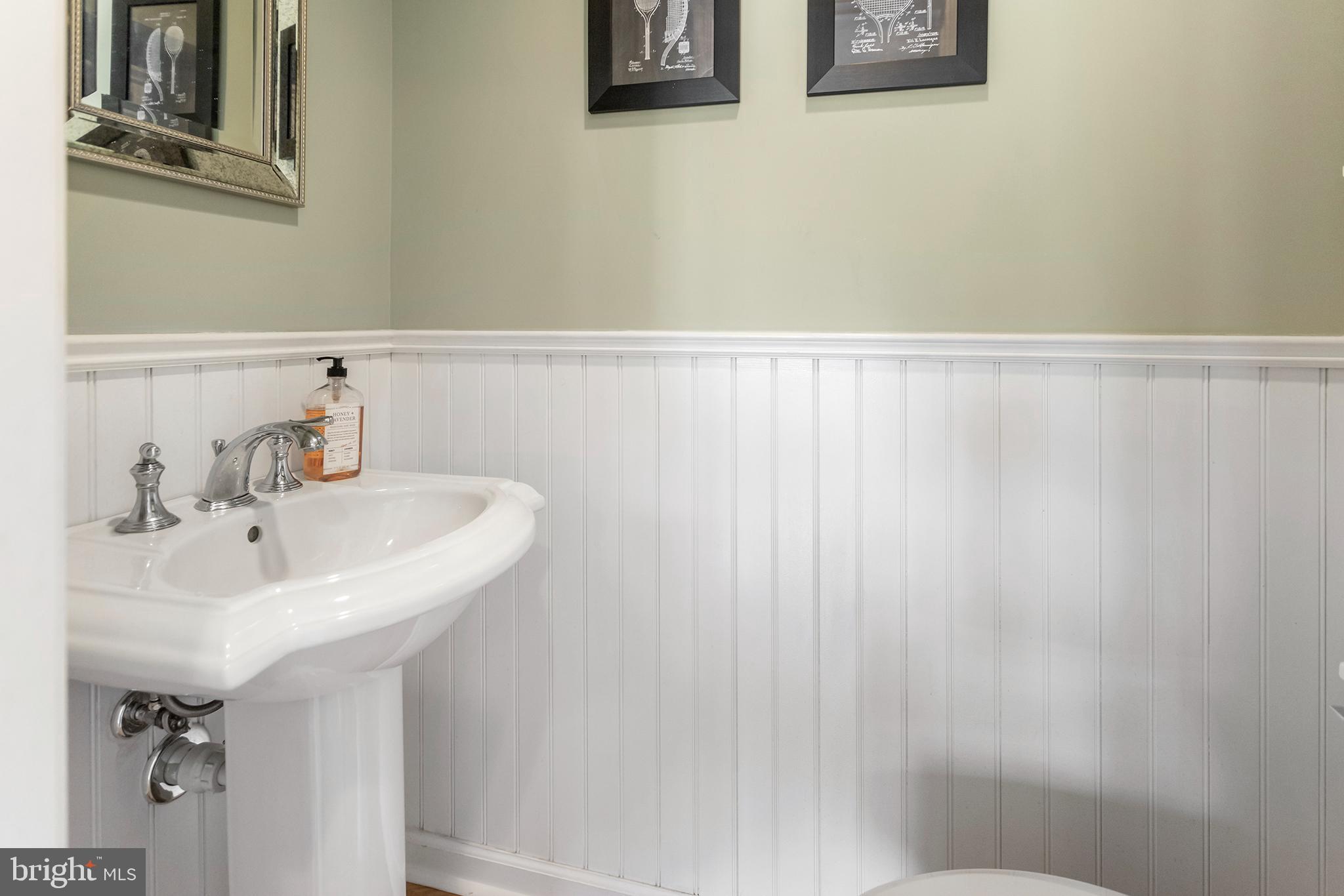 1806 Earlington Road Havertown, PA 19083 - Photo 12 of 27 a bathroom with a sink and a mirror