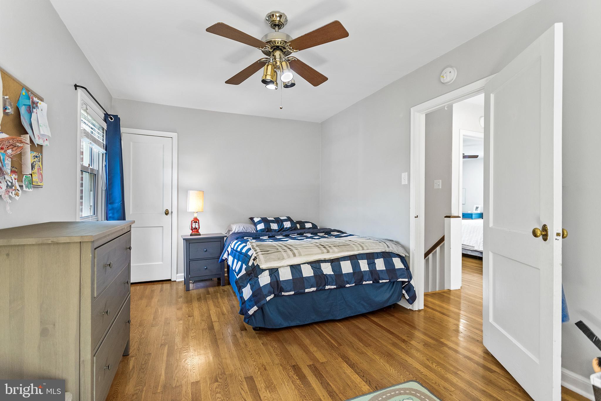 1806 Earlington Road Havertown, PA 19083 - Photo 13 of 27 a bedroom with a bed and a table in it