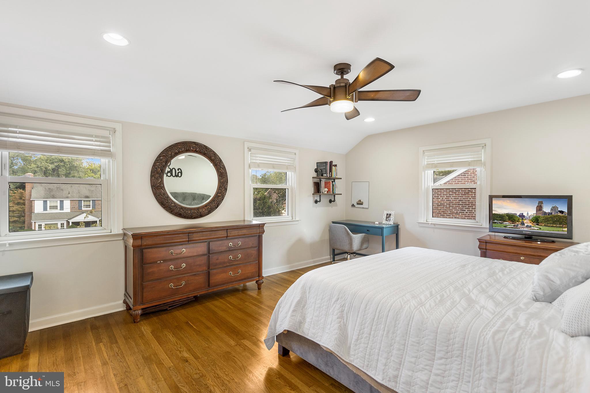 1806 Earlington Road Havertown, PA 19083 - Photo 18 of 27 a bedroom with a bed and a chandelier