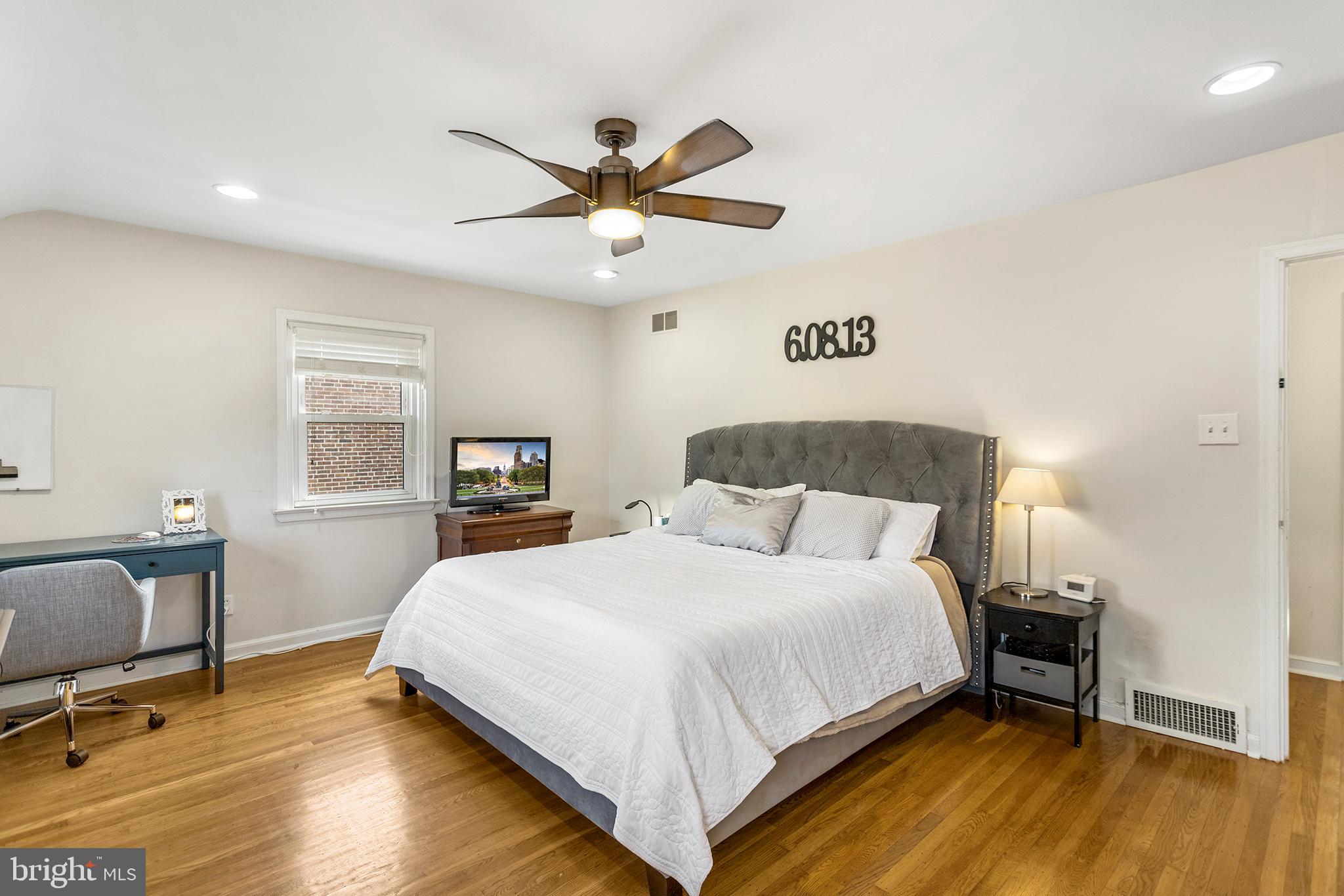 1806 Earlington Road Havertown, PA 19083 - Photo 20 of 27 a bedroom with a bed and a desk