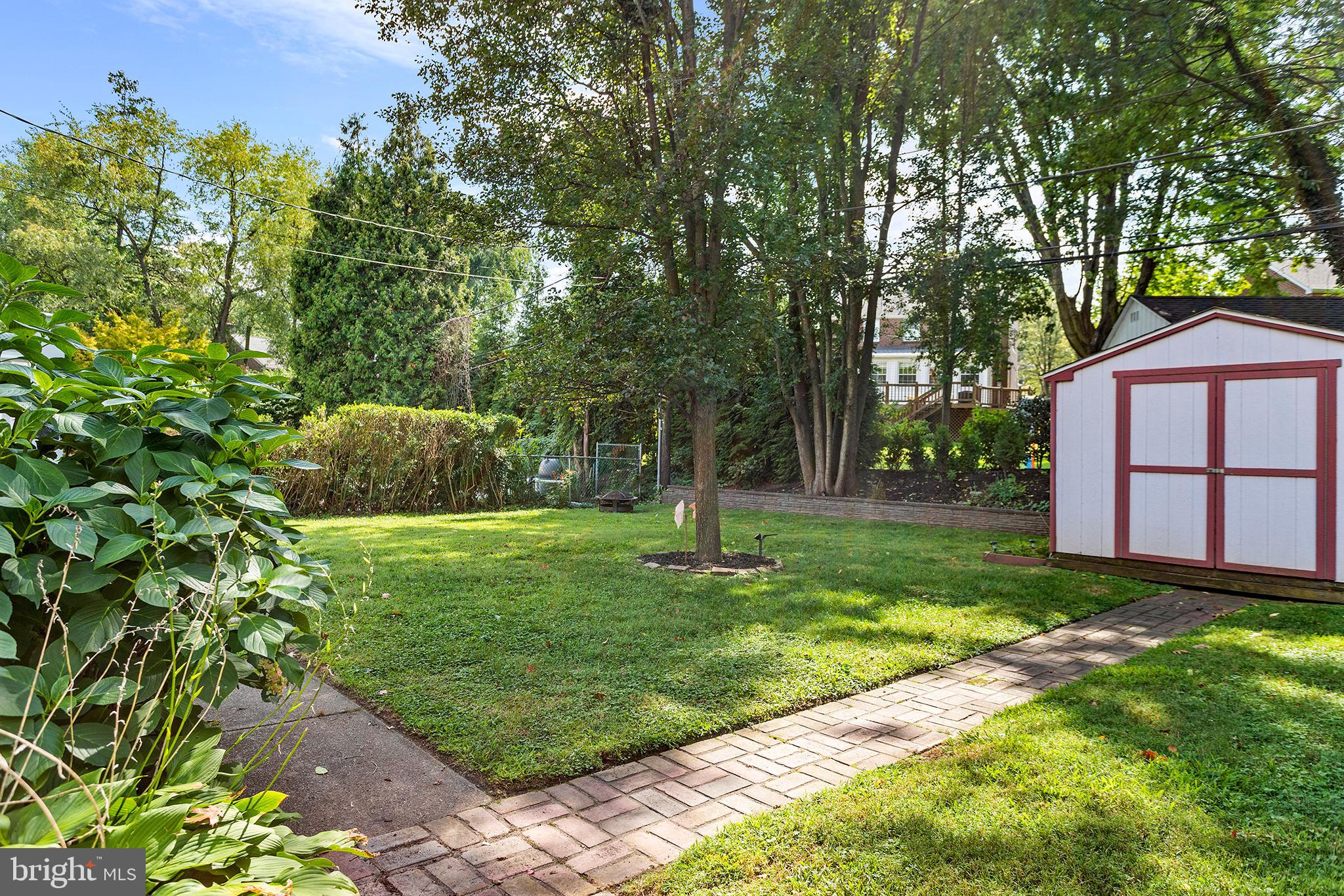 1806 Earlington Road Havertown, PA 19083 - Photo 26 of 27 a backyard of a house with lots of green space