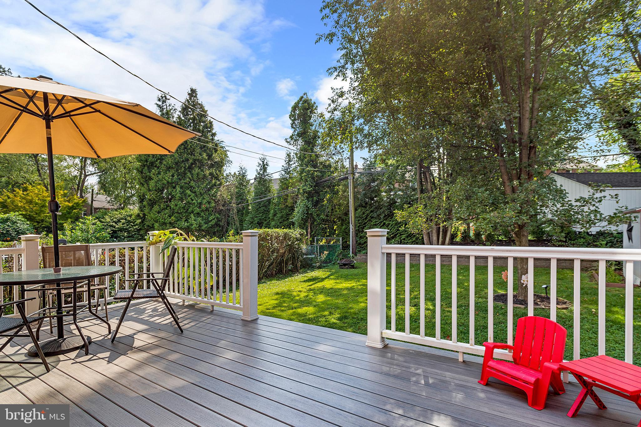 1806 Earlington Road Havertown, PA 19083 - Photo 27 of 27 a view of a deck with wooden floor and outdoor seating