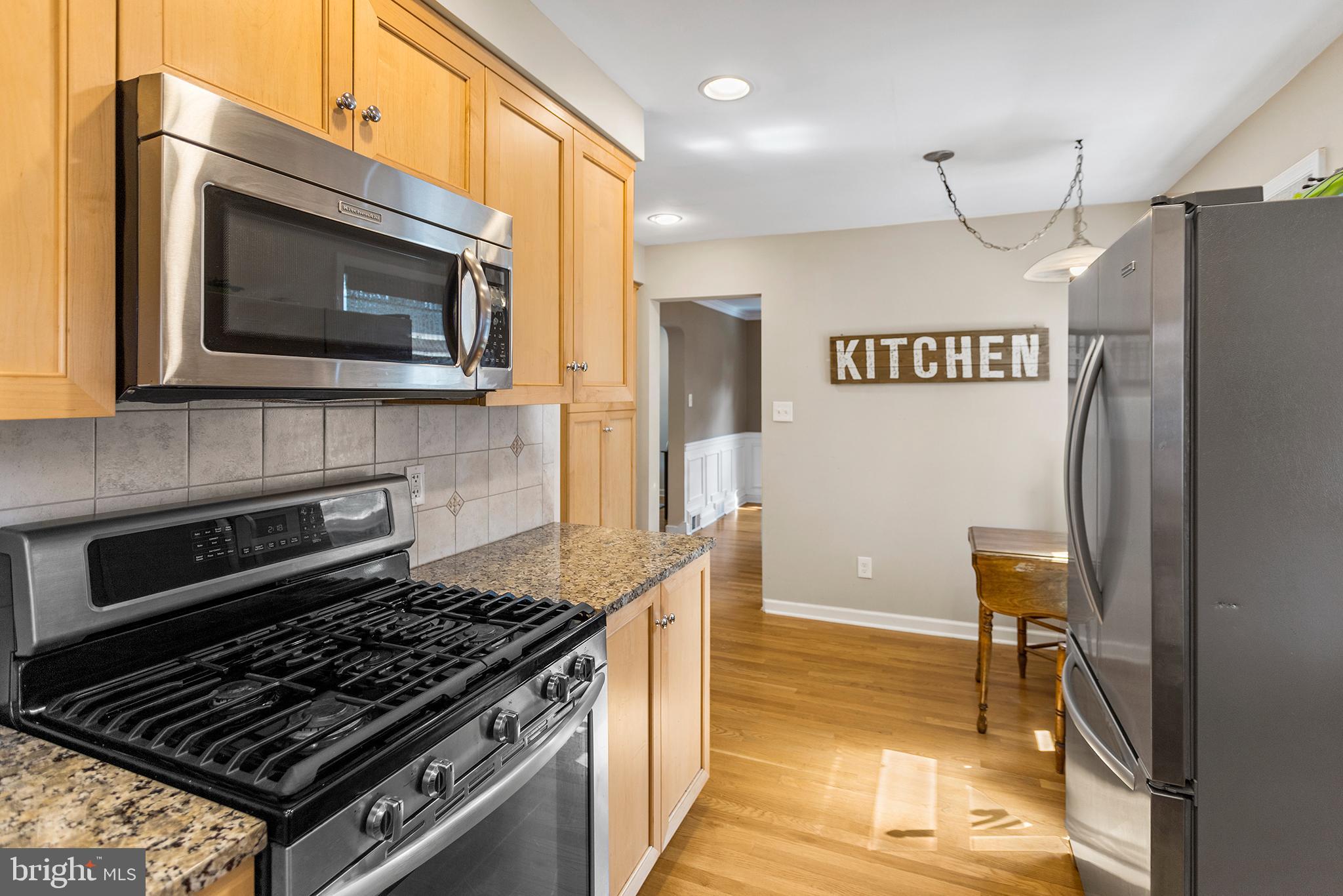 1806 Earlington Road Havertown, PA 19083 - Photo 8 of 27 a kitchen with a stove and a microwave