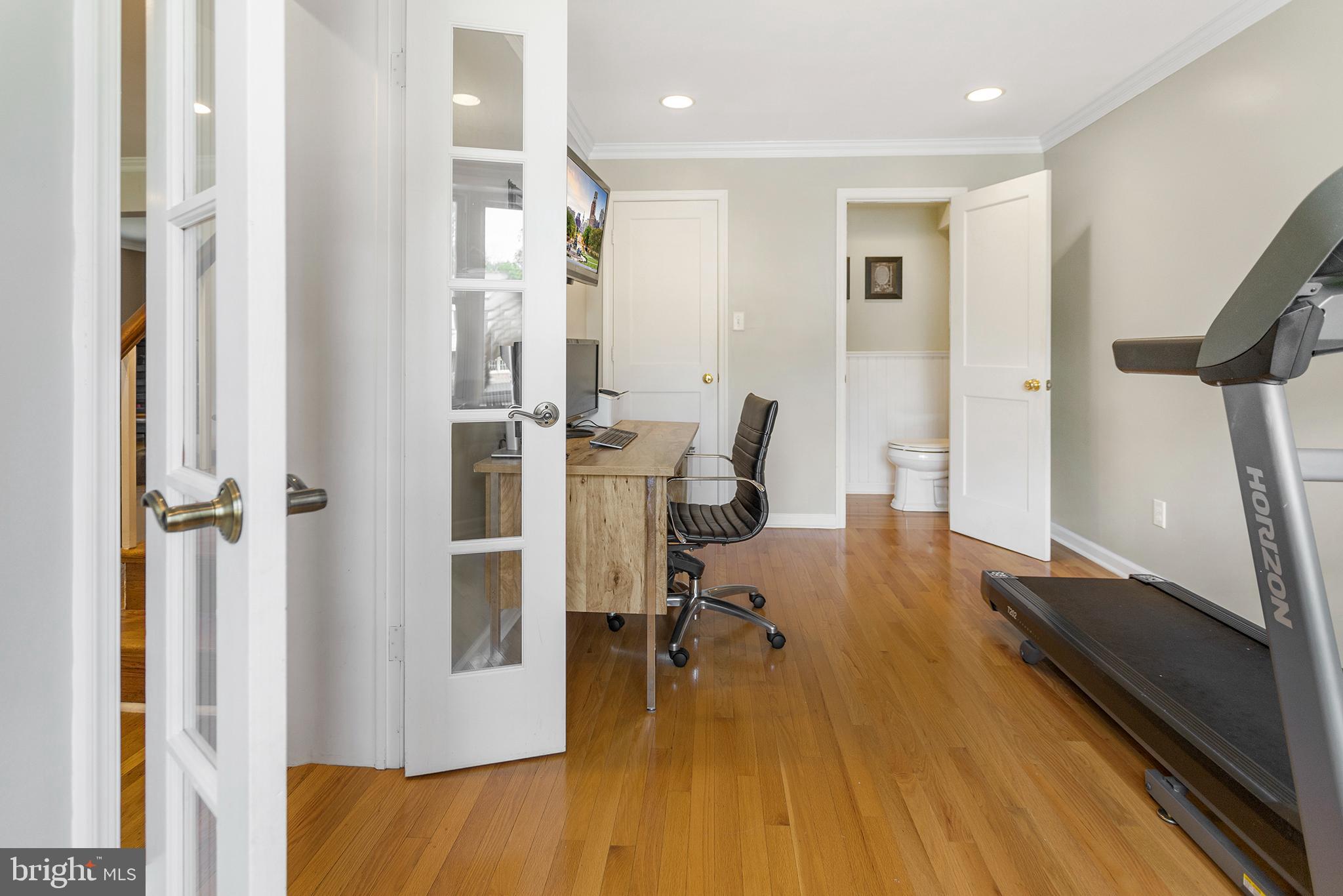 1806 Earlington Road Havertown, PA 19083 - Photo 10 of 27 a view of a living room with furniture and wooden floor