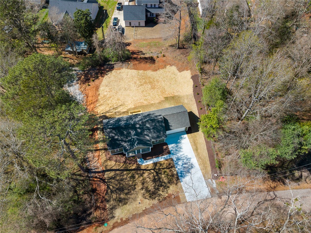 125 Cambridge Lane Pendleton, SC 29670 - Photo 20 of 22 An aerial perspective reveals a newly constructed residence nestled amidst natural surroundings.