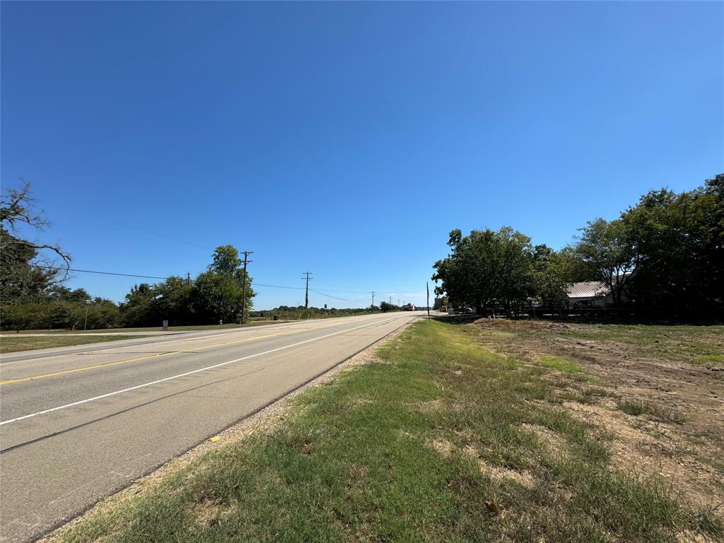 0 Bonham Street Paris, TX 75460 - Photo 4 of 5 a view of a field with an trees in the background