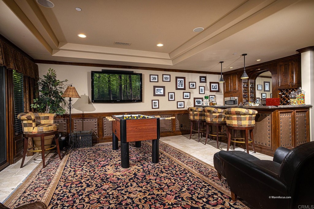 6103 Mimulus Rancho Santa Fe, CA 92067 - Photo 11 of 19 a living room with furniture and a rug