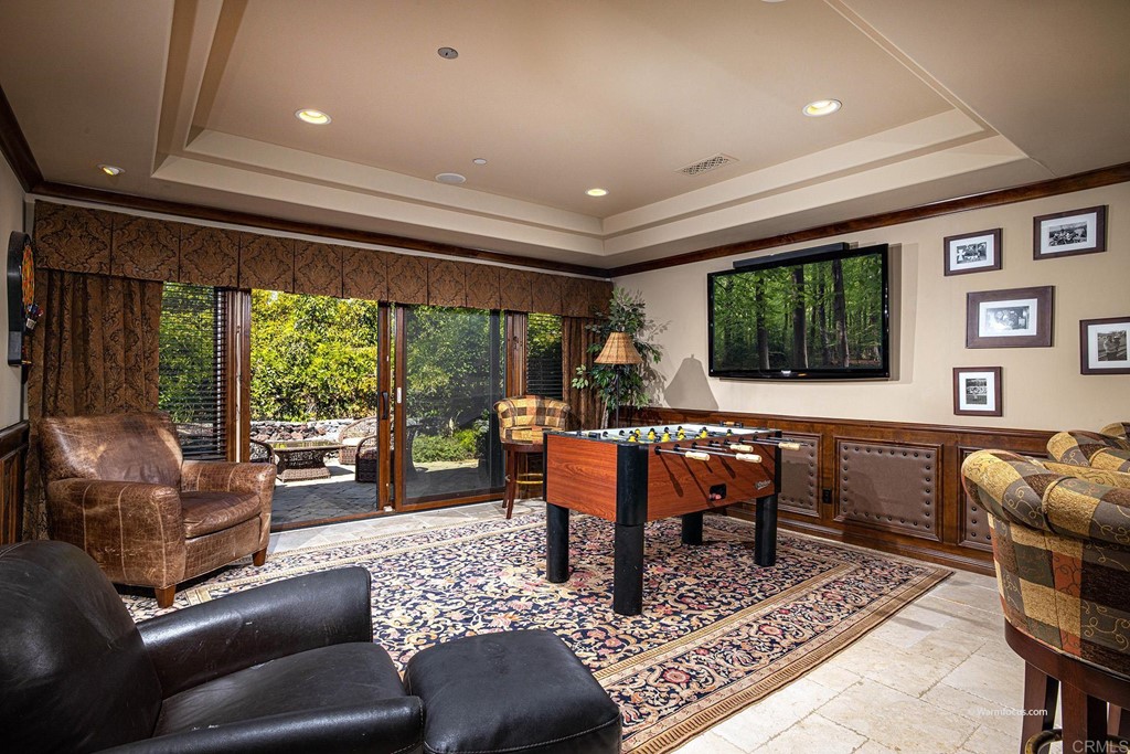 6103 Mimulus Rancho Santa Fe, CA 92067 - Photo 10 of 19 a living room with furniture and a floor to ceiling window
