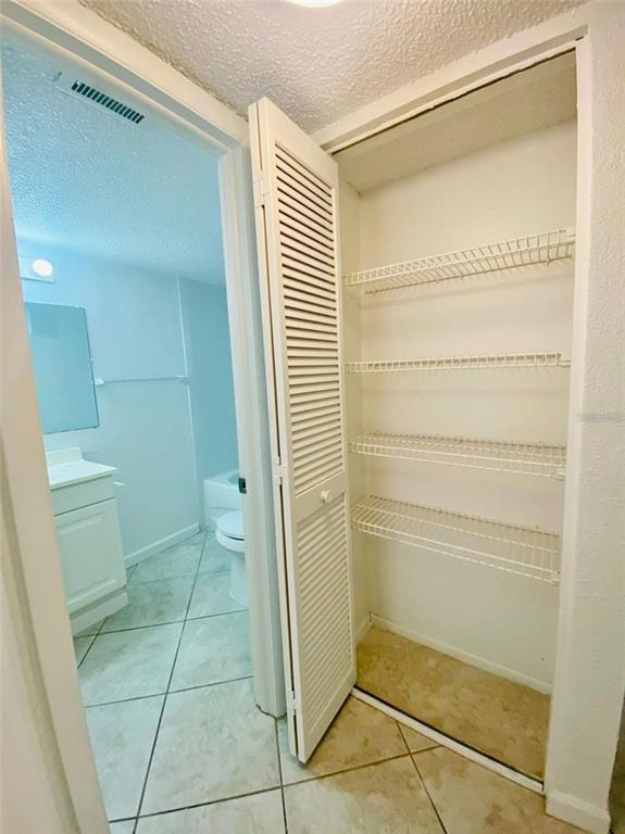 633 North Keene Road, Unit C Clearwater, FL 33755 - Photo 10 of 20 a bathroom with a shower