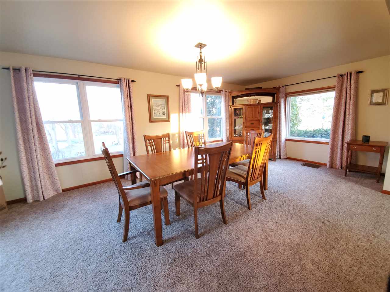 14375 West Springdale Road Forreston, IL 61030 - Photo 16 of 39 a dining room with furniture and window