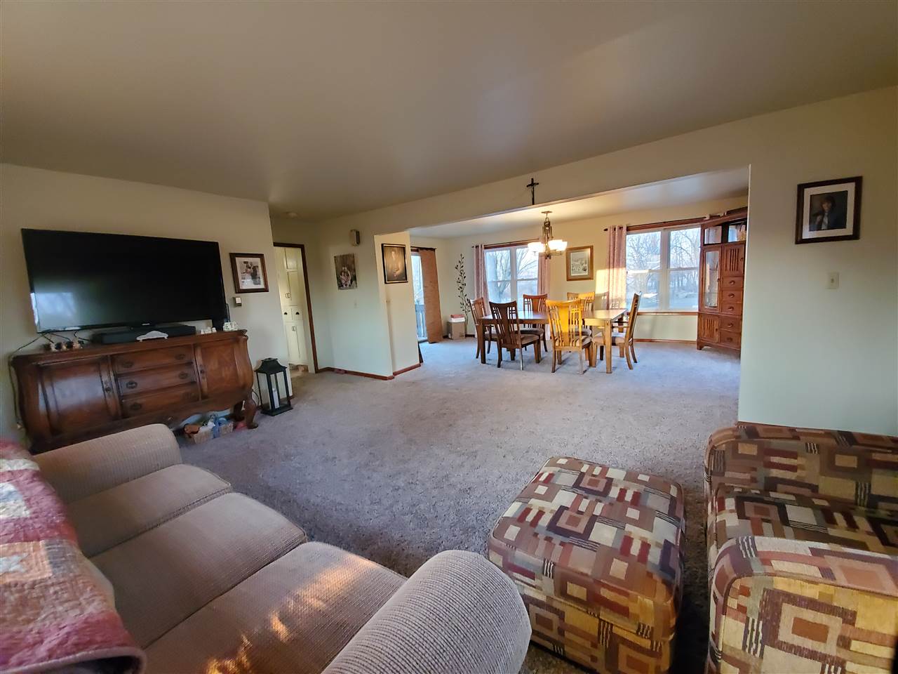 14375 West Springdale Road Forreston, IL 61030 - Photo 19 of 39 a living room with furniture and a flat screen tv