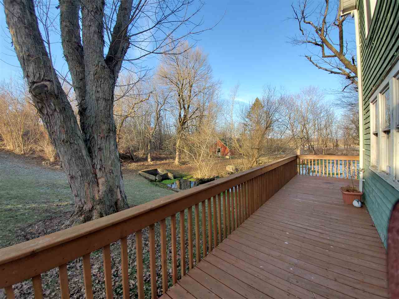 14375 West Springdale Road Forreston, IL 61030 - Photo 25 of 39 a view of balcony with wooden floor and fence