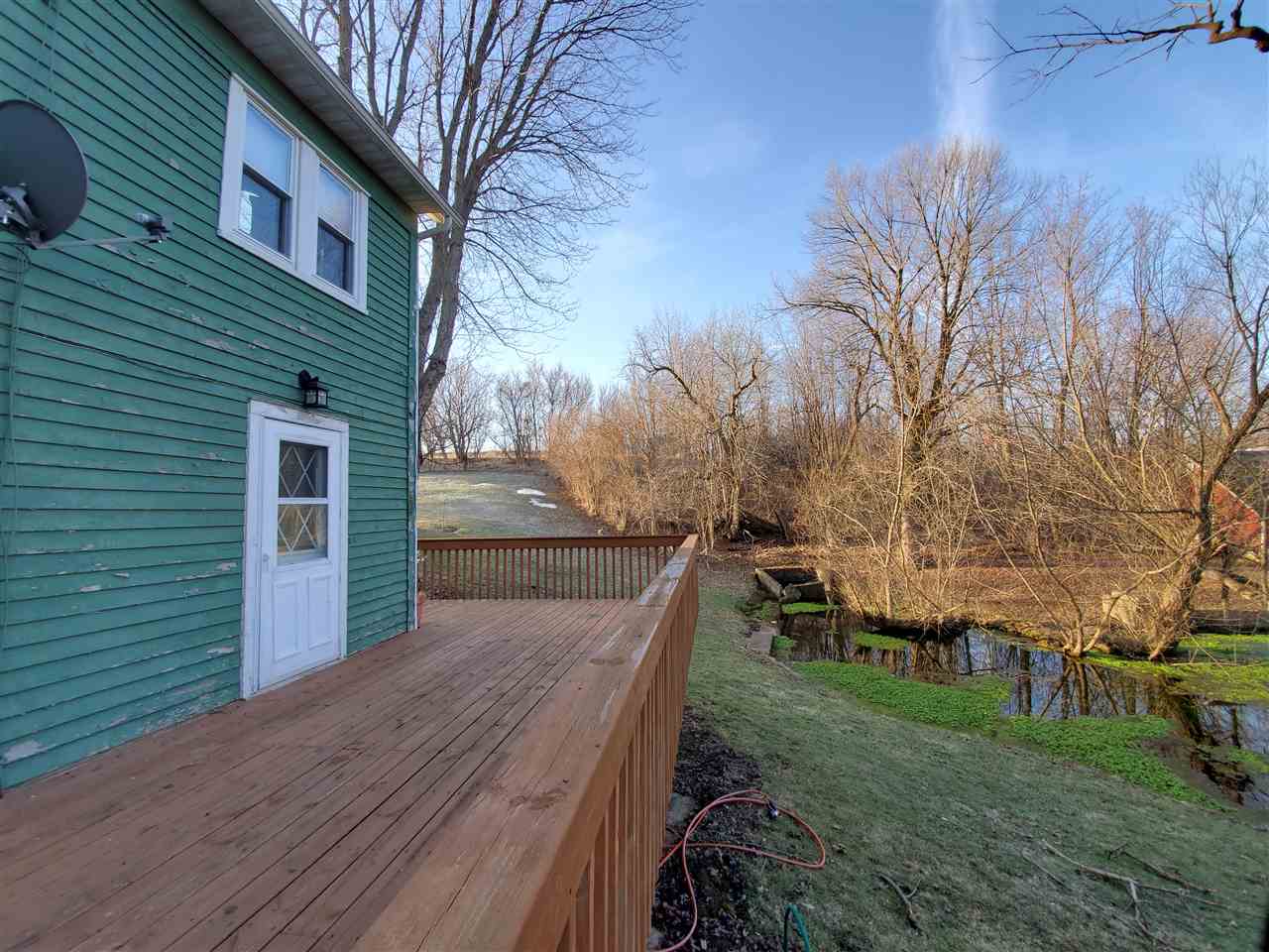 14375 West Springdale Road Forreston, IL 61030 - Photo 32 of 39 a view of a house with a yard