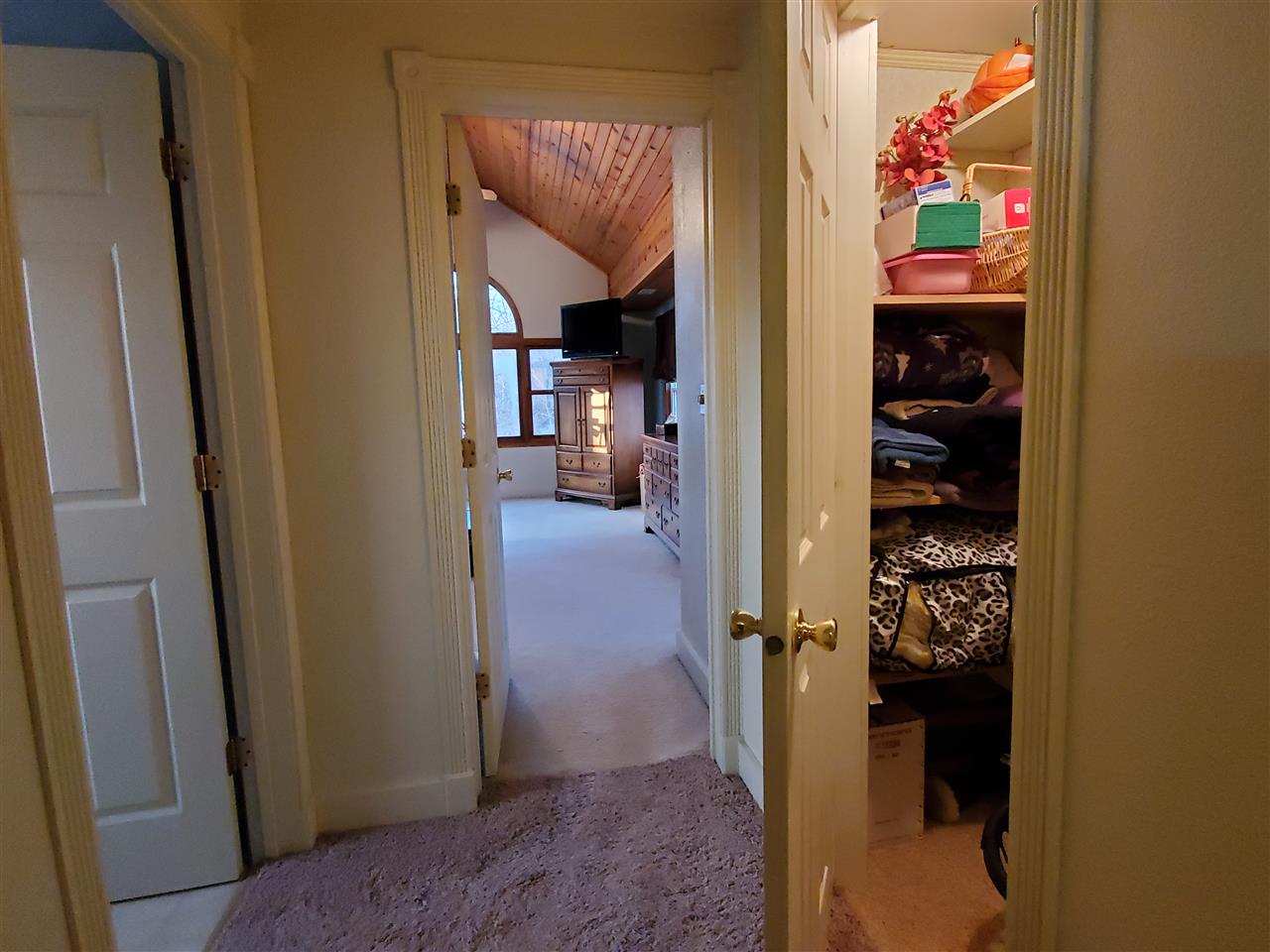 14375 West Springdale Road Forreston, IL 61030 - Photo 10 of 39 a view of a hallway with wooden floor and closet
