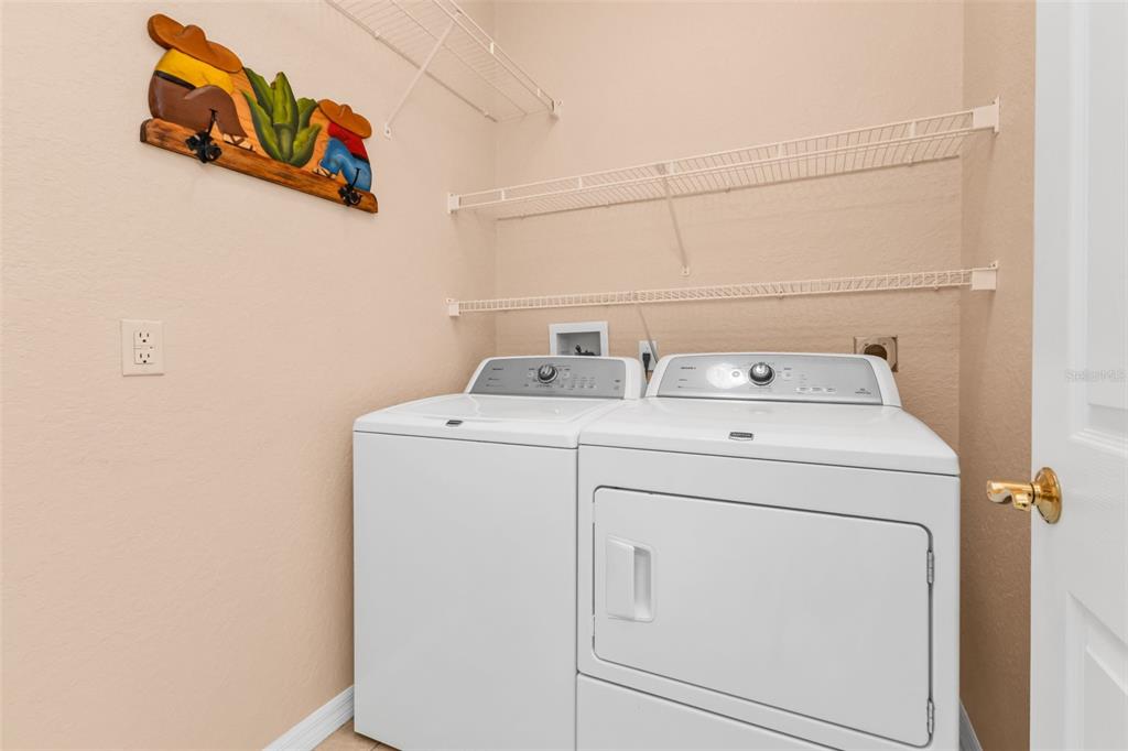 24116 Buckingham Way Punta Gorda, FL 33980 - Photo 19 of 42 a utility room with dryer and washer