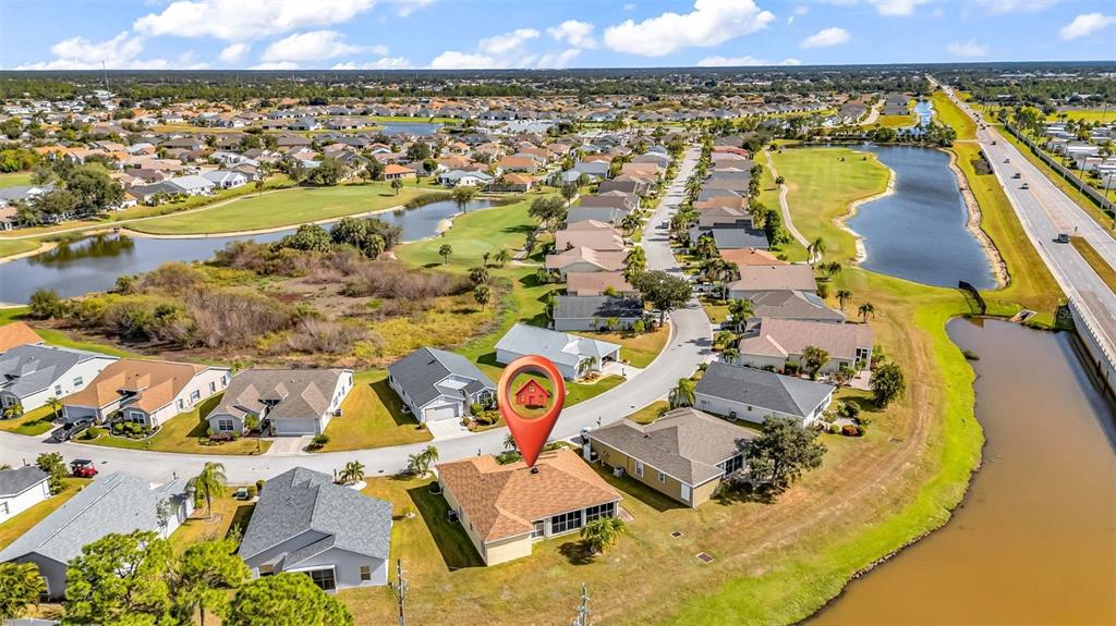 24116 Buckingham Way Punta Gorda, FL 33980 - Photo 20 of 42 an aerial view of residential houses with outdoor space