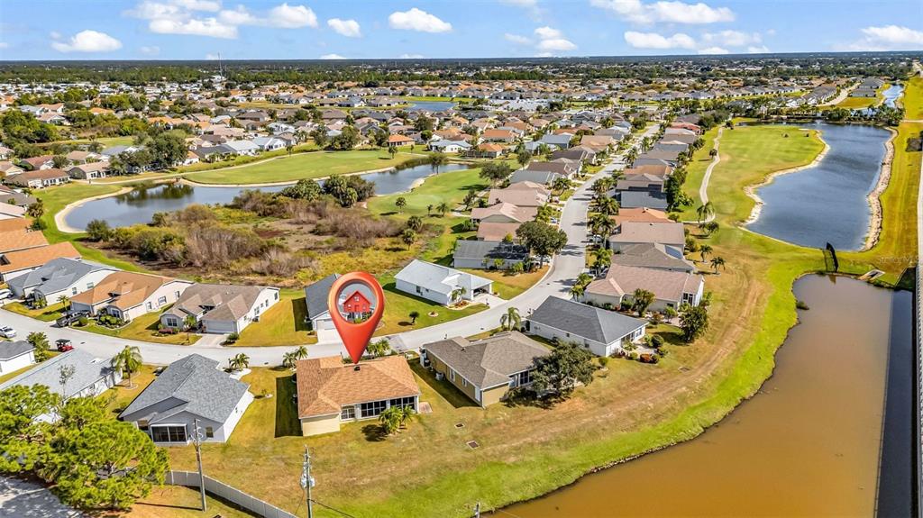24116 Buckingham Way Punta Gorda, FL 33980 - Photo 22 of 42 an aerial view of residential houses with outdoor space