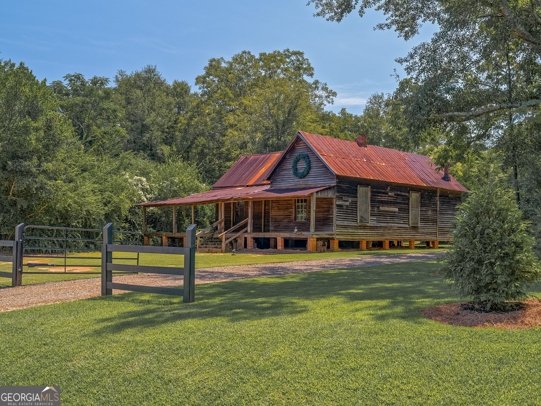 105 Buchanan Road Americus, GA 31719 - Photo 6 of 25 a view of a house with a yard