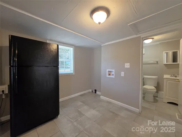 a view of a closet area with living room