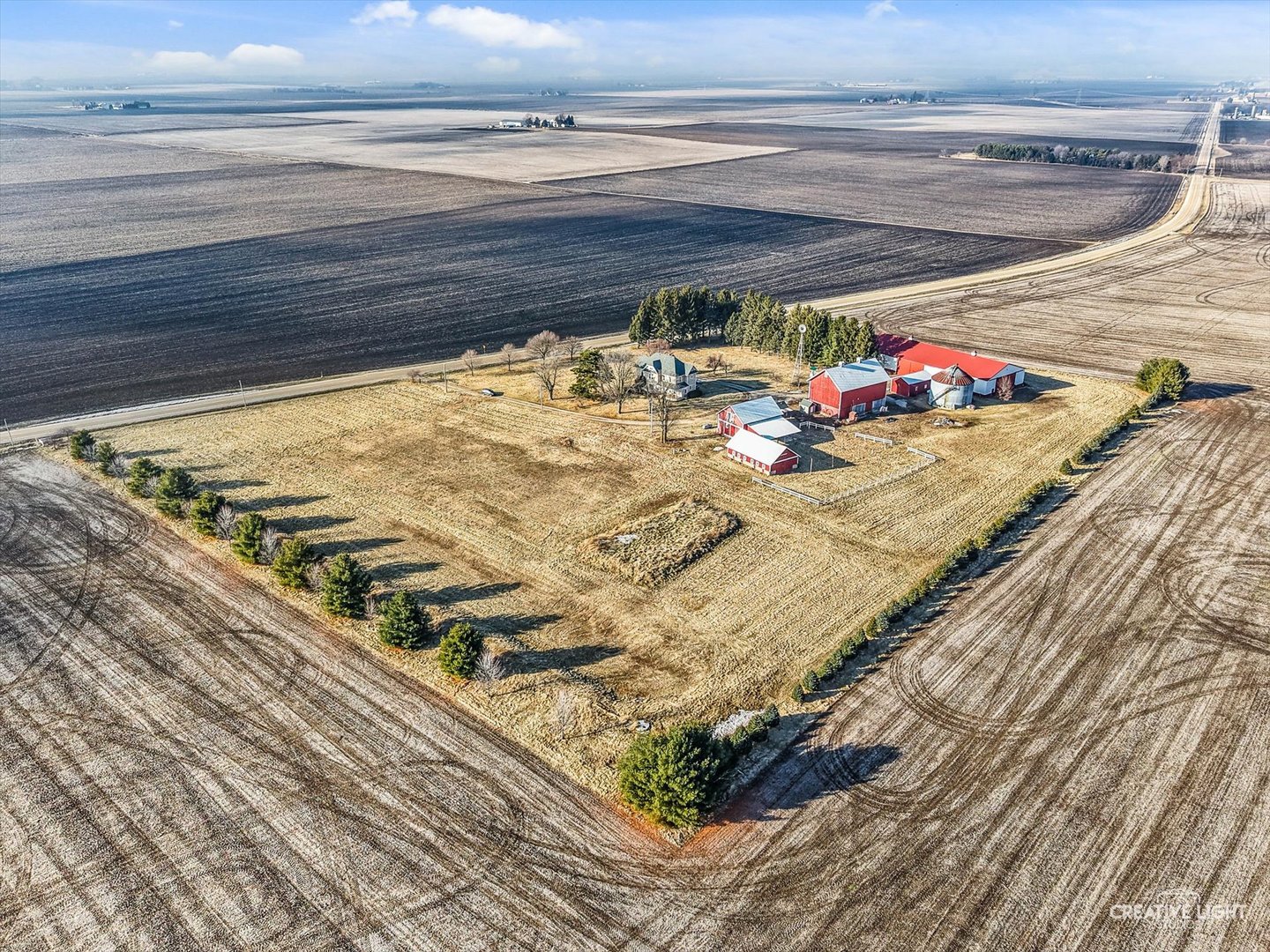 10256 Somonauk Road Hinckley, IL 60520 - Photo 38 of 44 a view of water heater room with wooden floor
