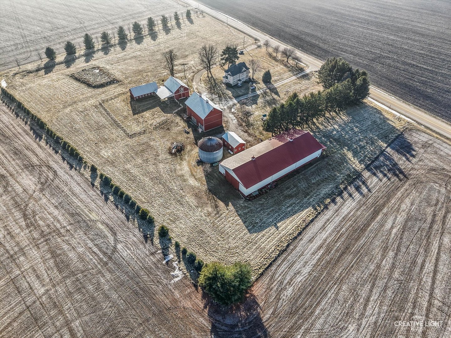 10256 Somonauk Road Hinckley, IL 60520 - Photo 40 of 44 a bed sitting next to a wooden floor