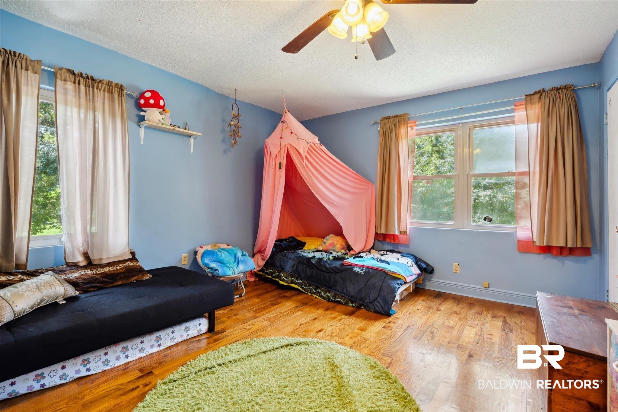 4851 Lesure Road Theodore, AL 36582 - Photo 15 of 21 Bedroom featuring ceiling fan and hardwood / wood-style floors