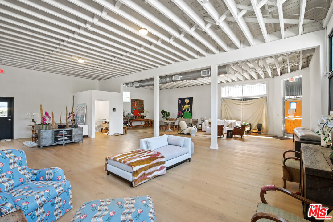 2331 4th Street Santa Monica, CA 90405 - Photo 5 of 10 a living room with furniture and a chandelier