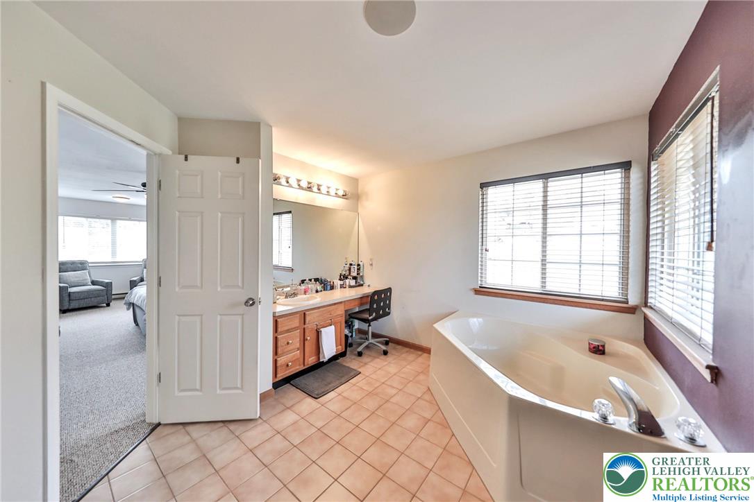 2260 Reo Drive Effort, PA 18330 - Photo 31 of 40 a bathroom with a bathtub and a shower