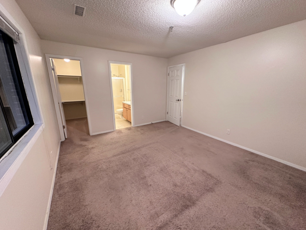 1350 Brook Street, Unit J St. Charles, IL 60174 - Photo 5 of 13 an empty room with windows