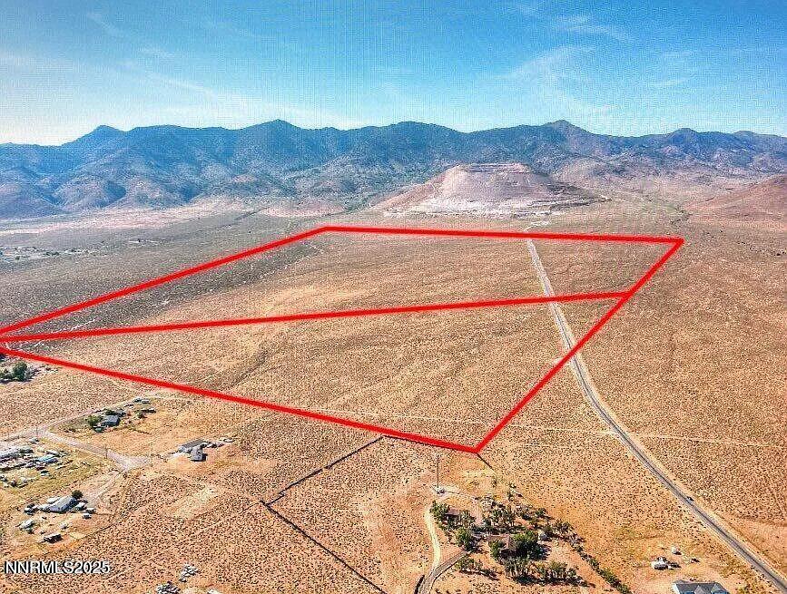 a view of swimming pool with a mountain view