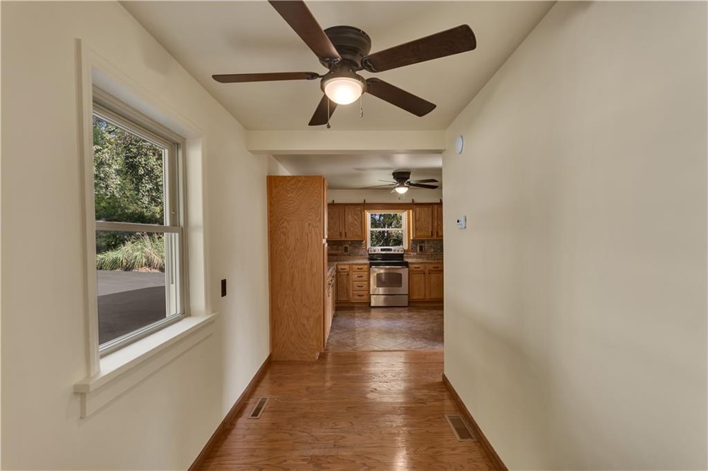 1585 Rte 481 Charleroi, PA 15022 - Photo 16 of 37 a view of a hallway with a dining table