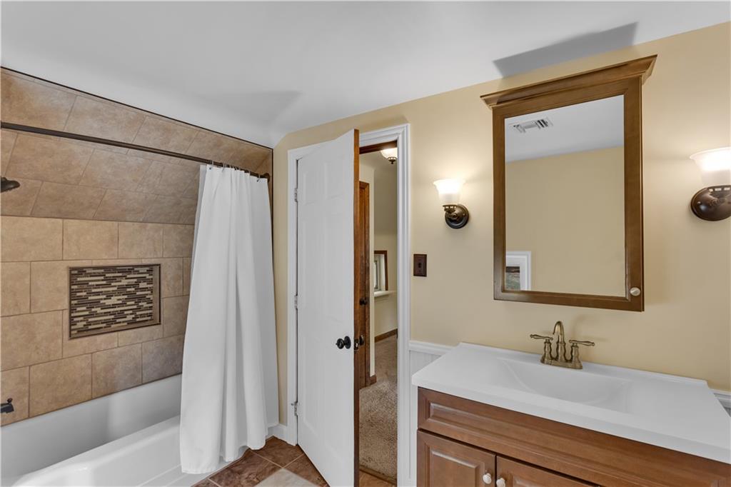 1585 Rte 481 Charleroi, PA 15022 - Photo 23 of 37 a bathroom with a sink and a mirror