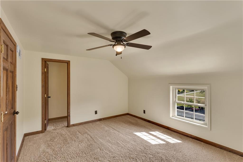 1585 Rte 481 Charleroi, PA 15022 - Photo 25 of 37 a view of a livingroom with a ceiling fan and window