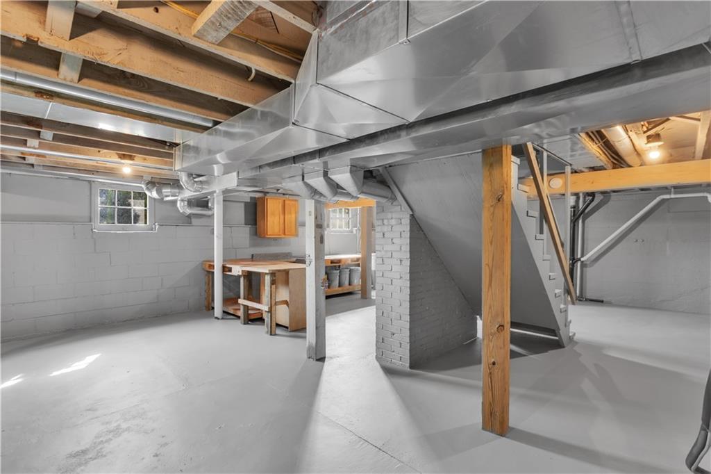 1585 Rte 481 Charleroi, PA 15022 - Photo 30 of 37 a view of an empty room with wooden floor and stairs