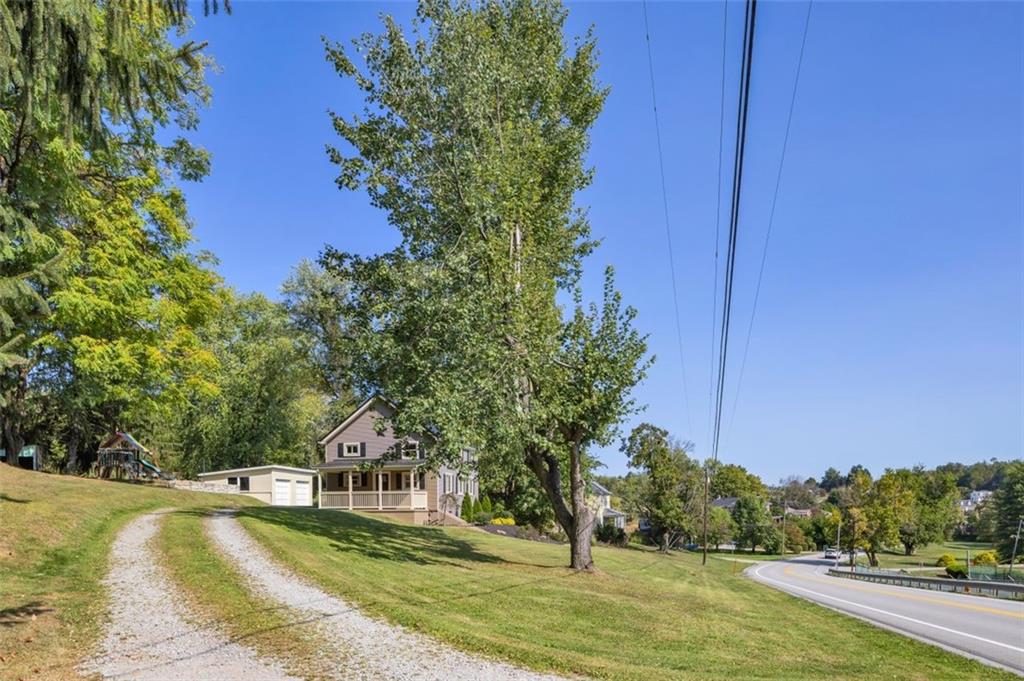 1585 Rte 481 Charleroi, PA 15022 - Photo 33 of 37 a view of a swimming pool with an outdoor space and seating area