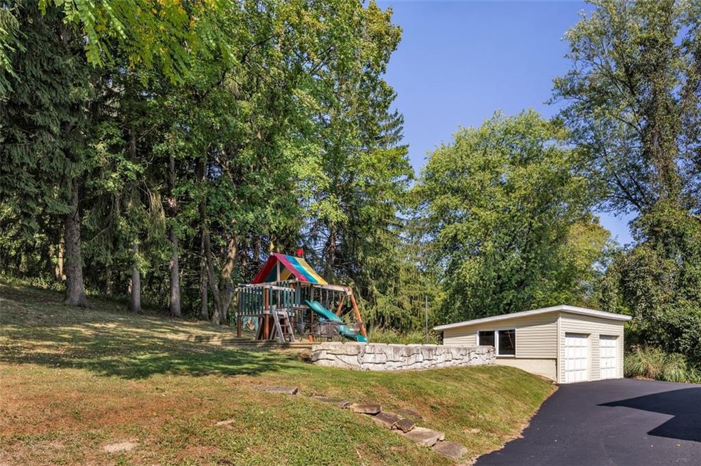 1585 Rte 481 Charleroi, PA 15022 - Photo 34 of 37 a view of a house with a yard and sitting area