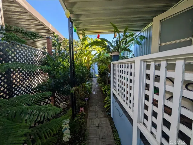 a view of a house with a flower garden