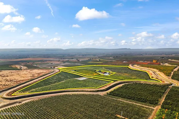 a view of a swimming pool with a yard