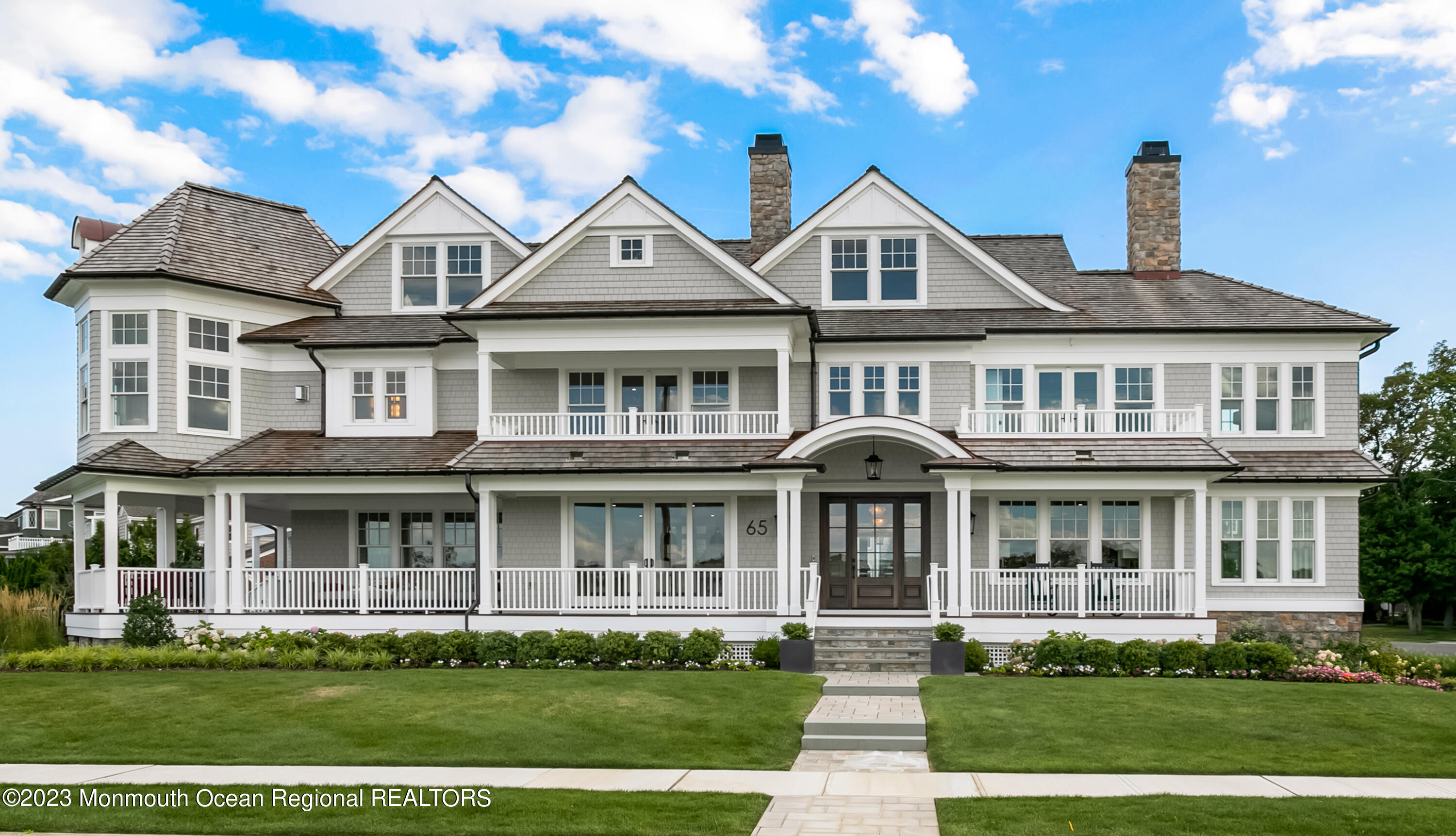 65 South Boulevard Spring Lake, NJ 07762 - Photo 2 of 80 a front view of a house with a yard