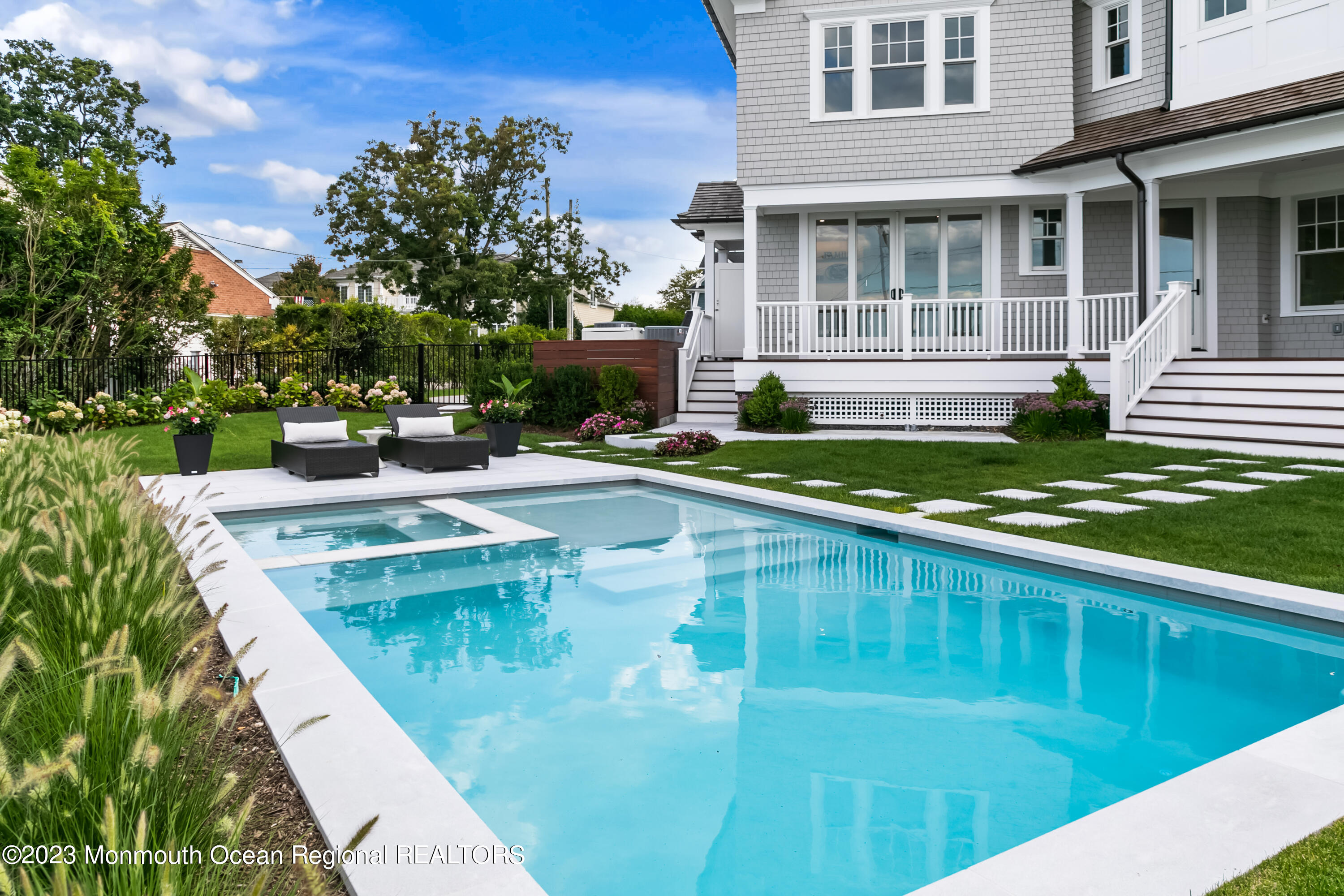 65 South Boulevard Spring Lake, NJ 07762 - Photo 36 of 80 a view of a house with backyard swimming pool and sitting area