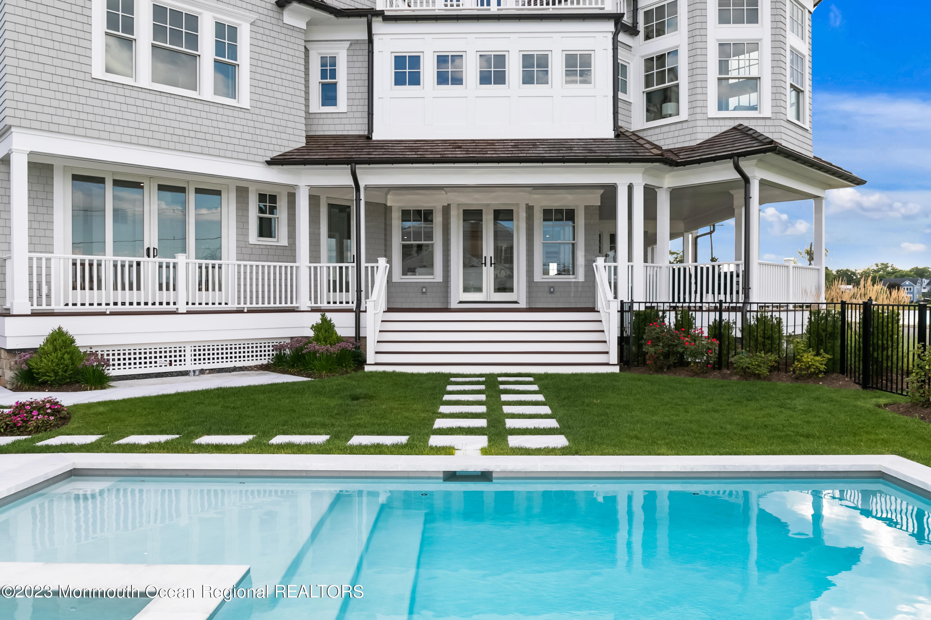 65 South Boulevard Spring Lake, NJ 07762 - Photo 37 of 80 a front view of a house with a yard