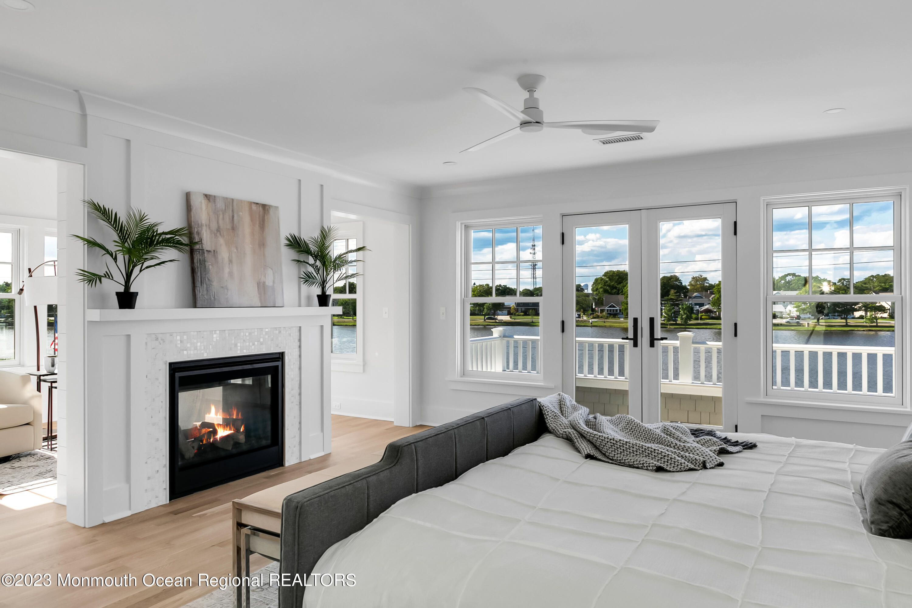 65 South Boulevard Spring Lake, NJ 07762 - Photo 53 of 80 a bedroom with a bed and a fireplace