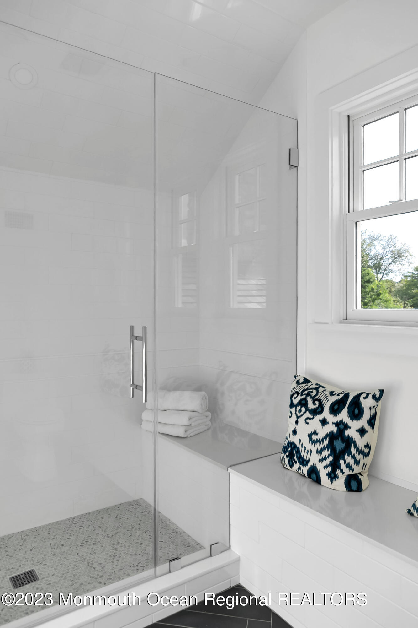65 South Boulevard Spring Lake, NJ 07762 - Photo 68 of 80 a bathroom with a glass shower door